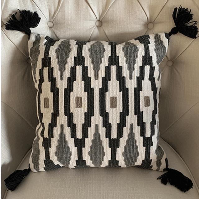 Rental store for black and white tassel pillow in Portland Oregon